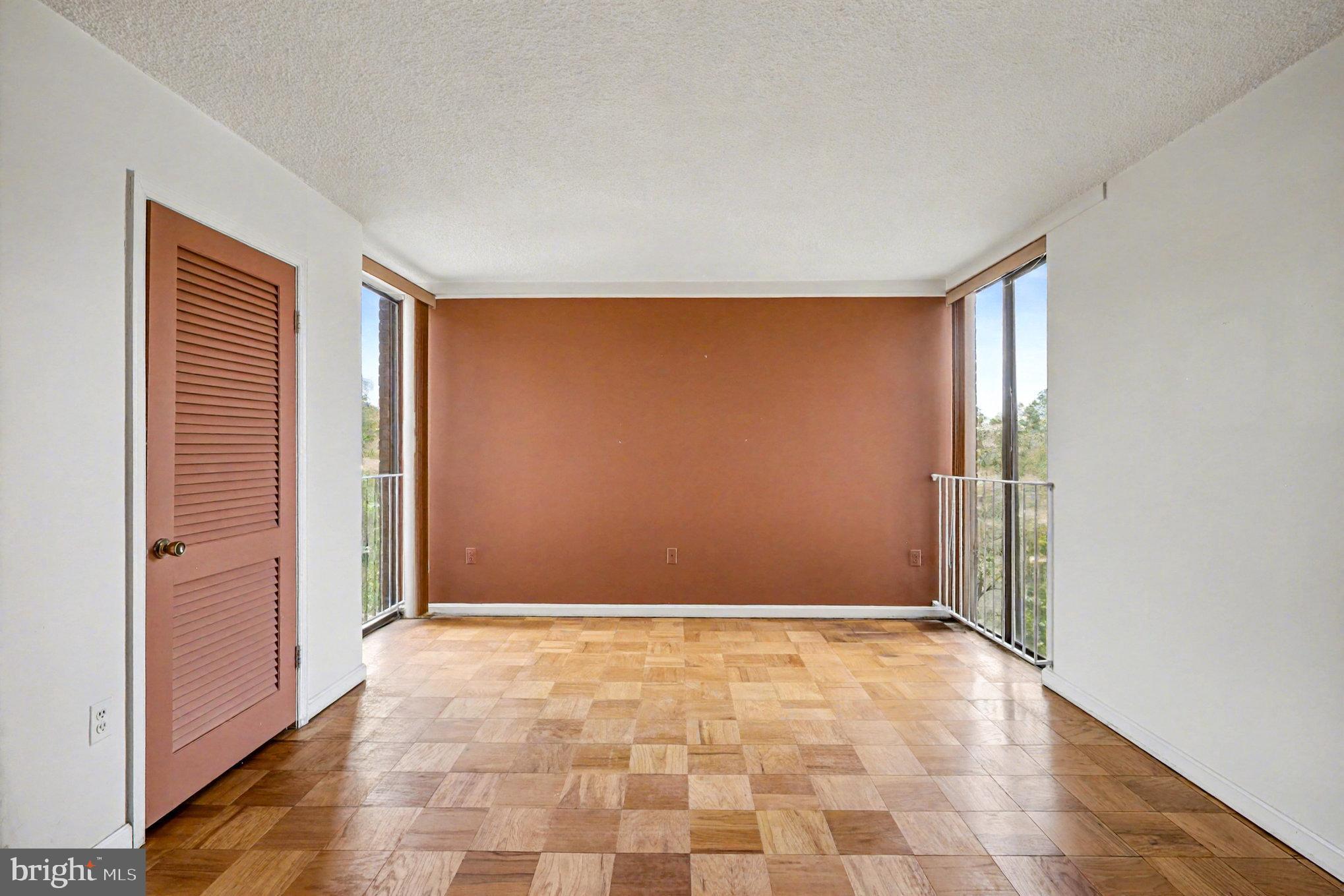 2100 Washington Avenue, Unit 6B Silver Spring, MD 20910 - Photo 21 of 33 an empty room with windows