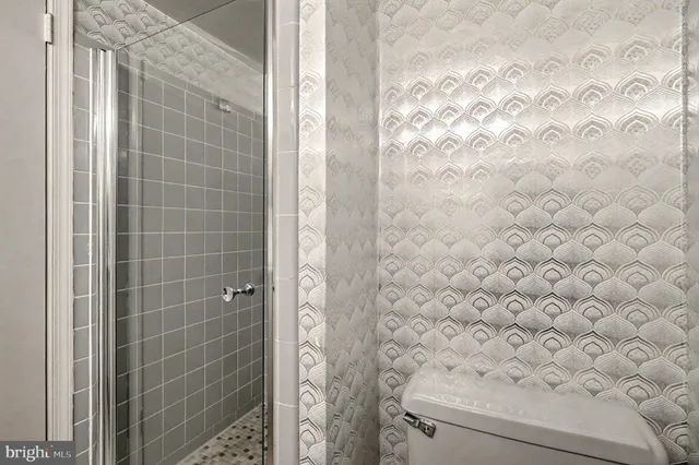 a bathroom with a shower curtain