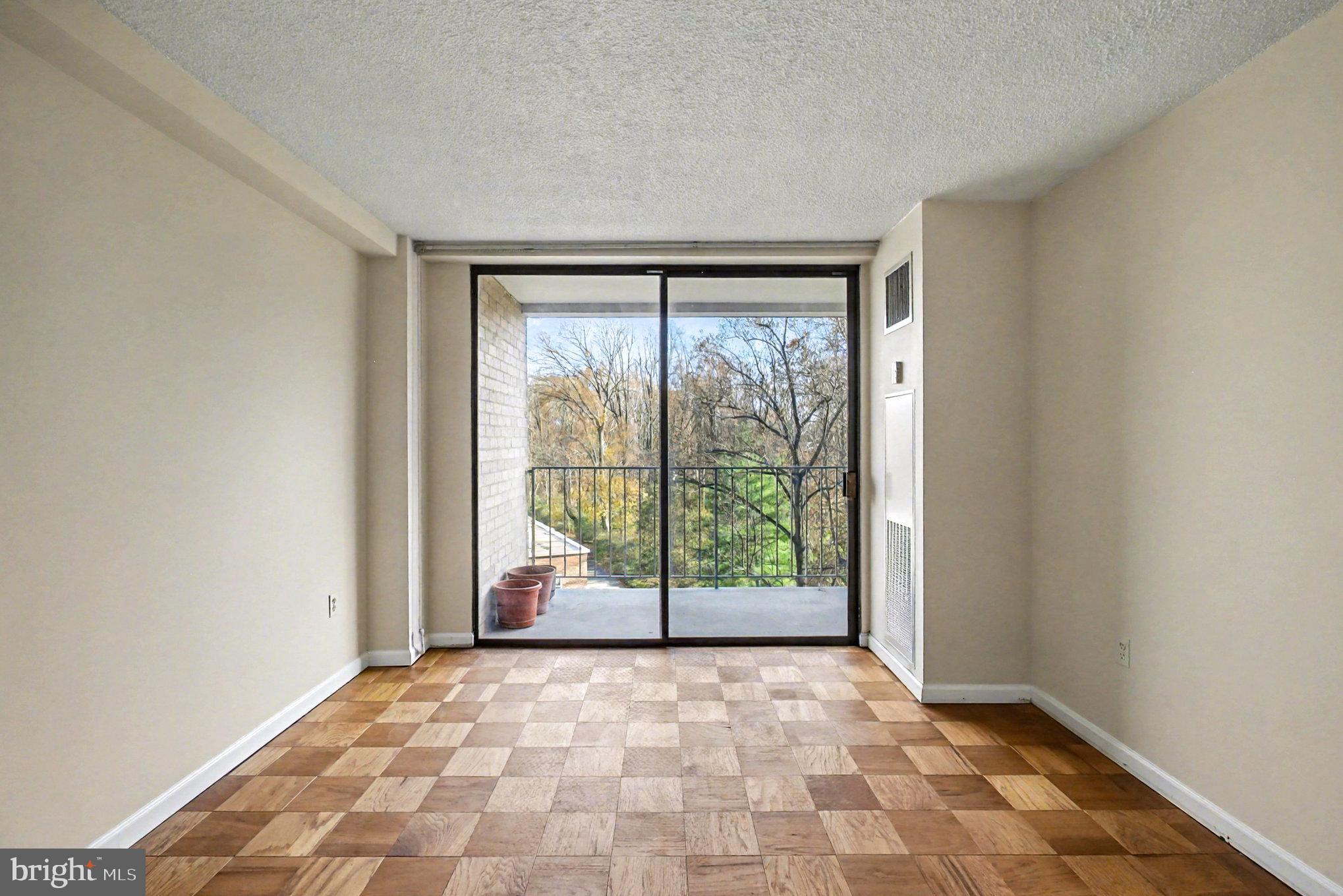 2100 Washington Avenue, Unit 6B Silver Spring, MD 20910 - Photo 27 of 33 a view of an empty room with a window