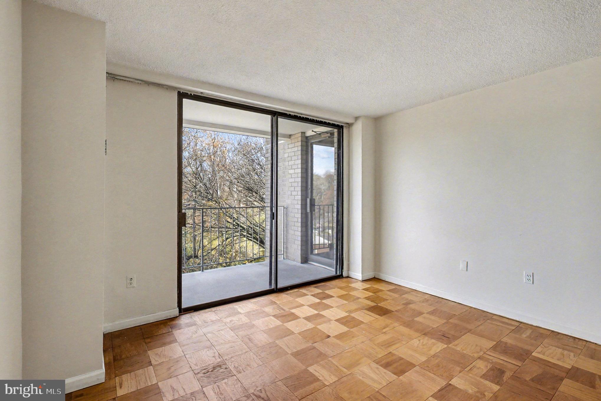2100 Washington Avenue, Unit 6B Silver Spring, MD 20910 - Photo 28 of 33 a view of an empty room with a window