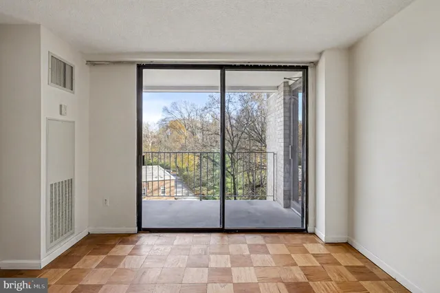 a view of an empty room and window