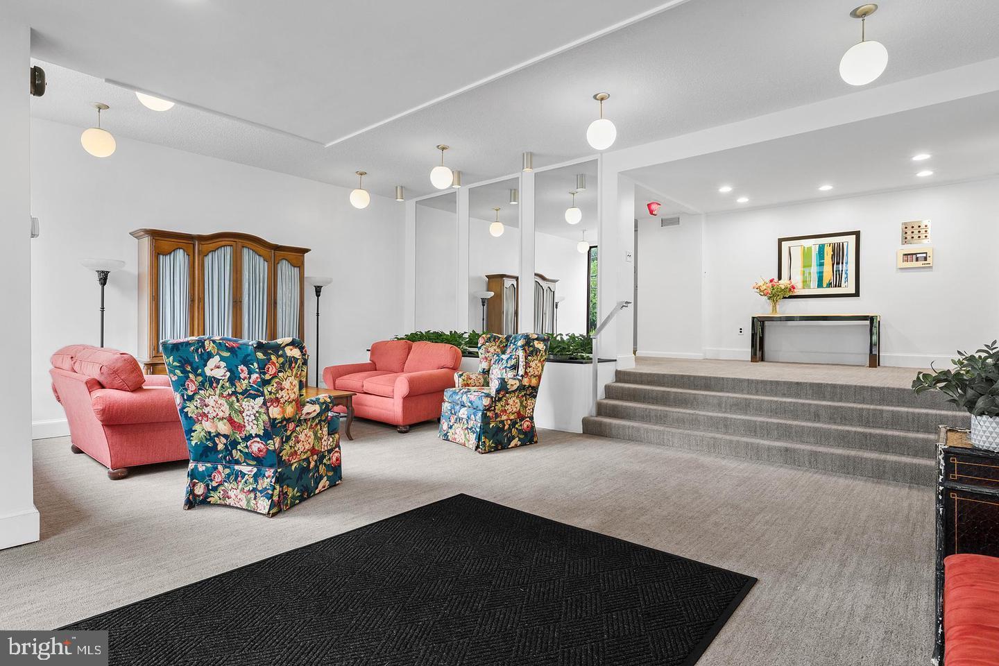 2100 Washington Avenue, Unit 6B Silver Spring, MD 20910 - Photo 4 of 33 a lobby with furniture and a chandelier