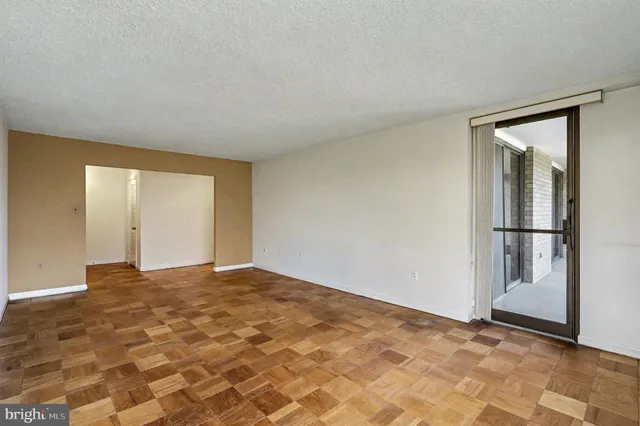 a view of an empty room and window
