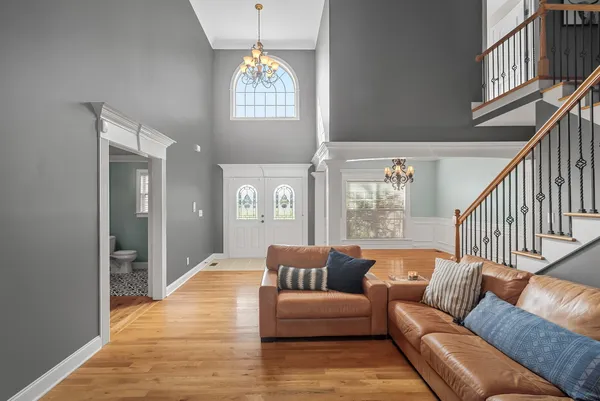 a bedroom with a bed and a night stand