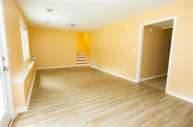 a view of entryway with wooden floor
