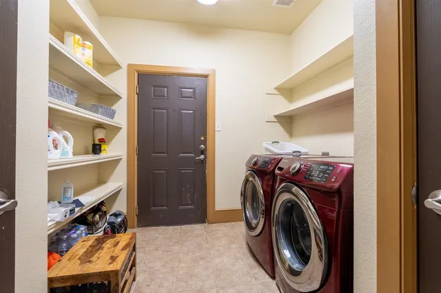 a living room with furniture a window and a ceiling fan