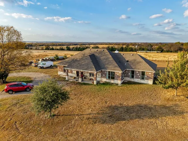 a view of a livingroom with furniture and an entryway