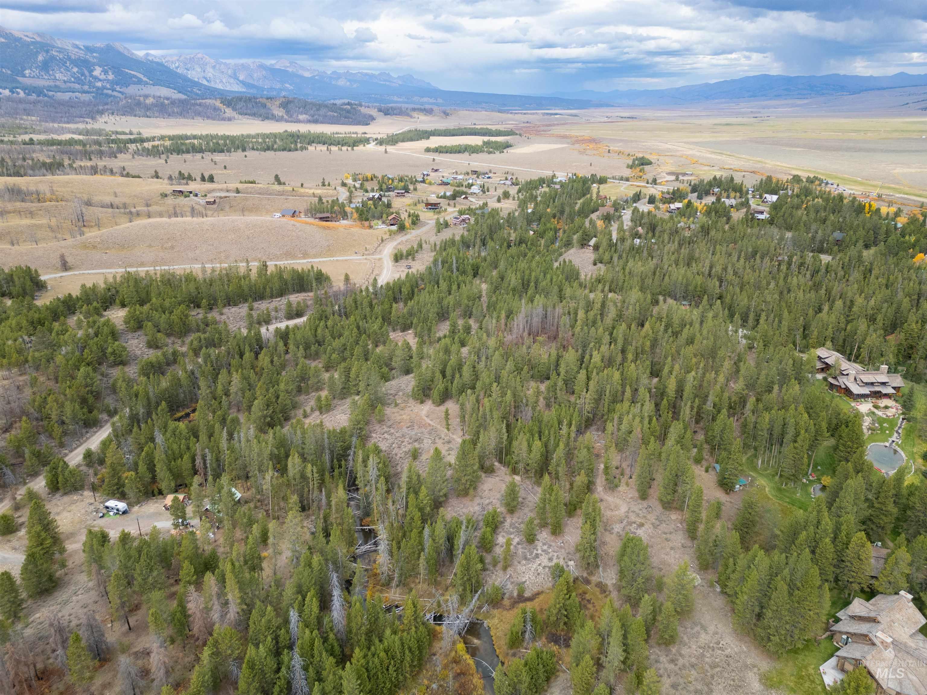 773 Smiley Creek Road Ketchum, ID 83340 - Photo 13 of 27 Aerial view of property and surrounding area with a mountain backdrop