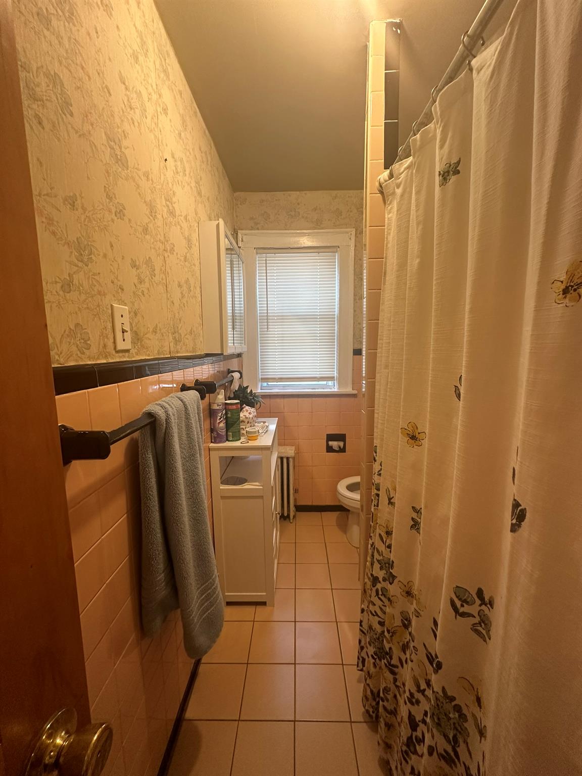 221-13 104th Avenue Queens, NY 11429 - Photo 13 of 18 Bathroom with tile patterned floors, toilet, tile walls, vanity, and radiator