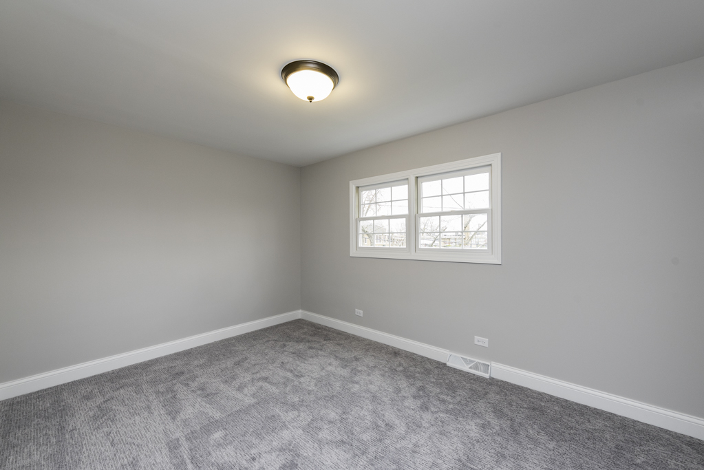 24199 West Beach Grove Road Antioch, IL 60002 - Photo 18 of 22 an empty room with a window