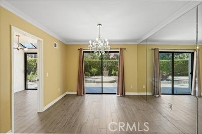 19565 Turtle Springs Way Porter Ranch, CA 91326 - Photo 37 of 96 Dining room with slider to the yard
