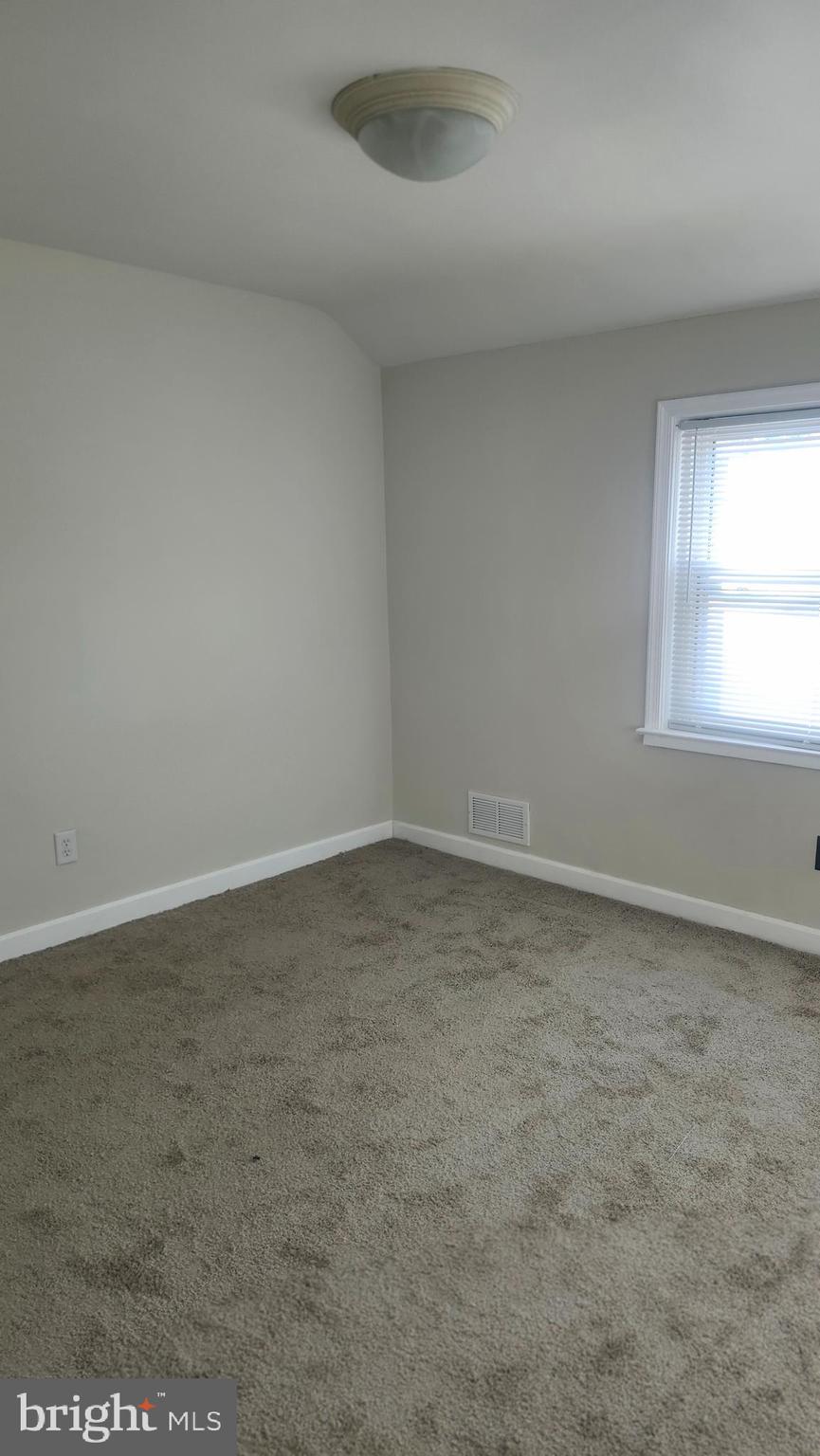 1001 Cameron Road Baltimore, MD 21212 - Photo 25 of 46 an empty room with a window