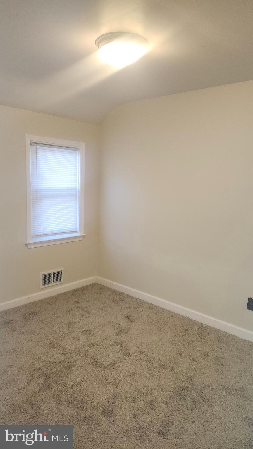 1001 Cameron Road Baltimore, MD 21212 - Photo 29 of 46 an empty room with a window