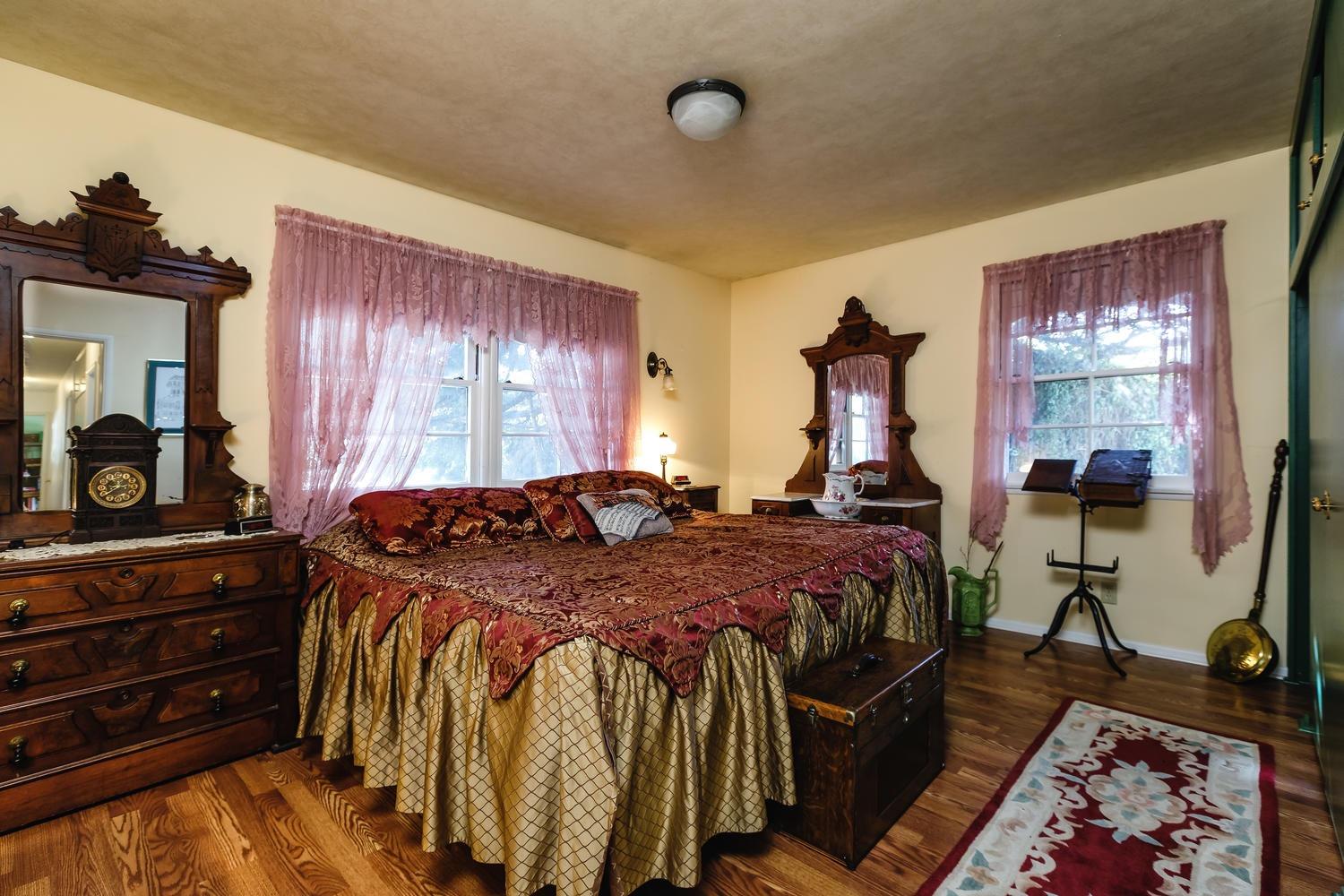 819 Daly Road Ojai, CA 93023 - Photo 11 of 25 a bed sitting in a bedroom next to a window