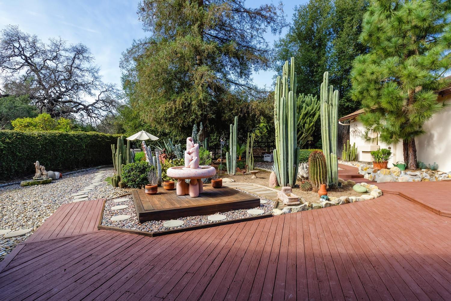 819 Daly Road Ojai, CA 93023 - Photo 16 of 25 a view of a house with sitting area and garden