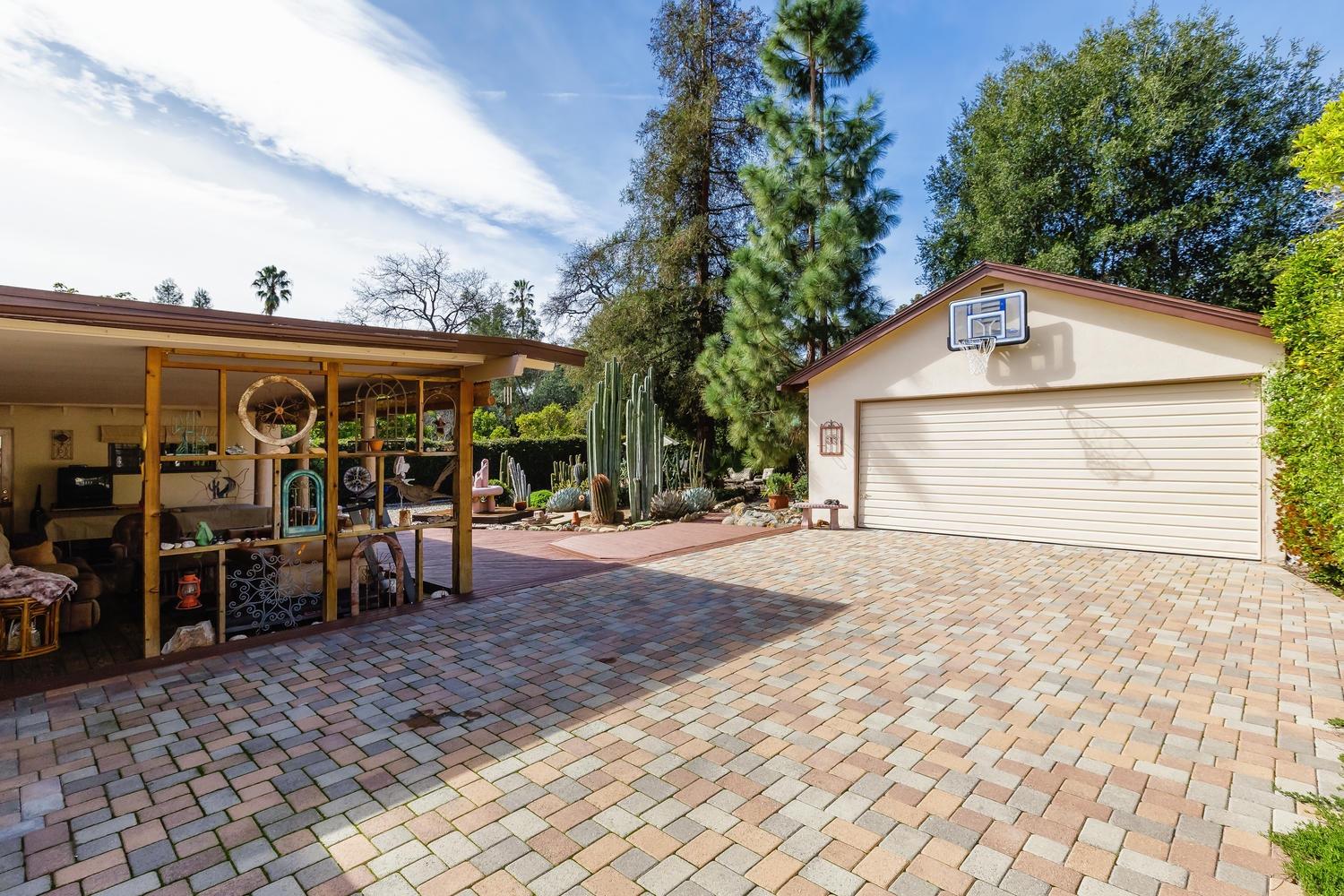 819 Daly Road Ojai, CA 93023 - Photo 21 of 25 a front view of a house with garden