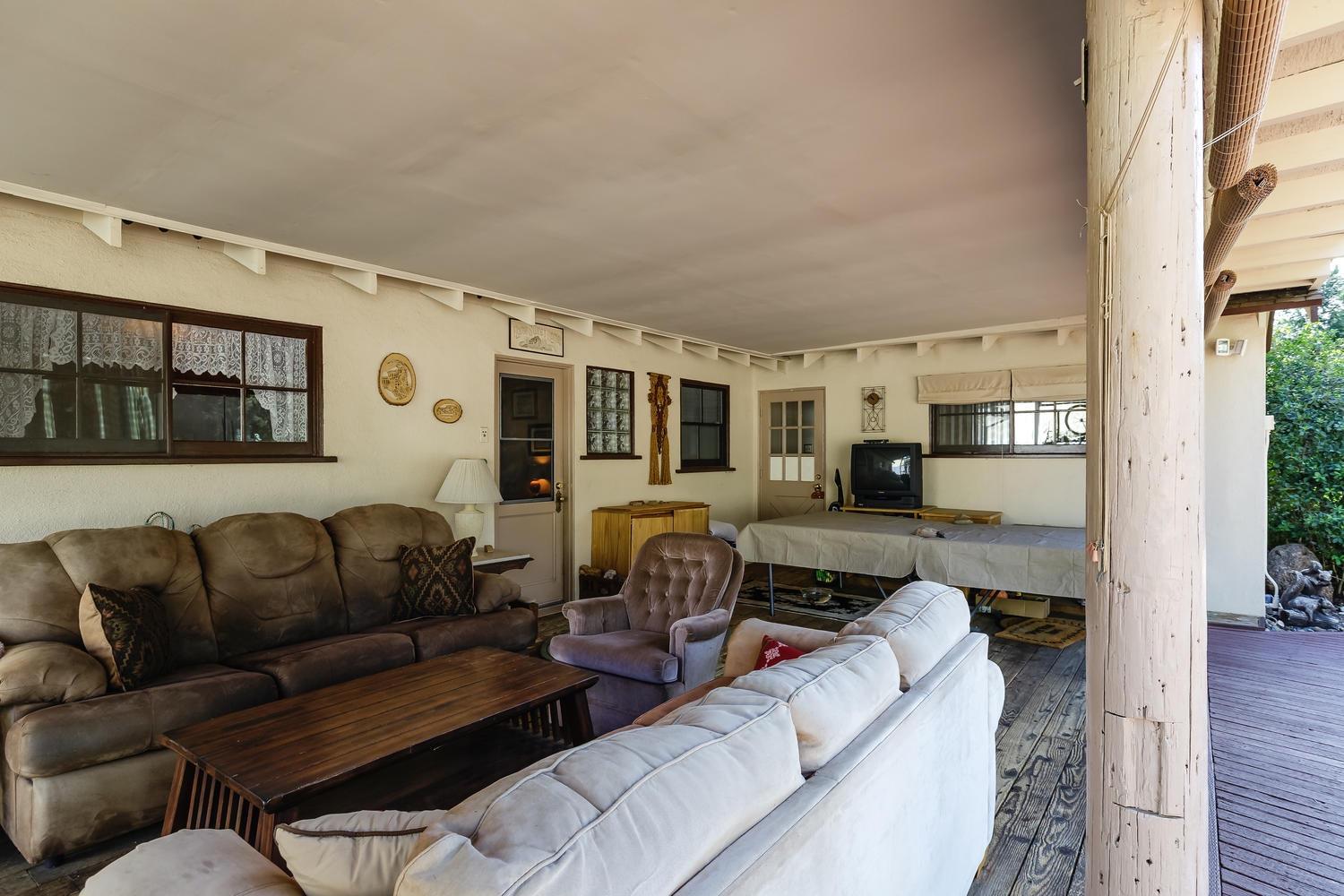 819 Daly Road Ojai, CA 93023 - Photo 22 of 25 a living room with furniture and a wooden floor