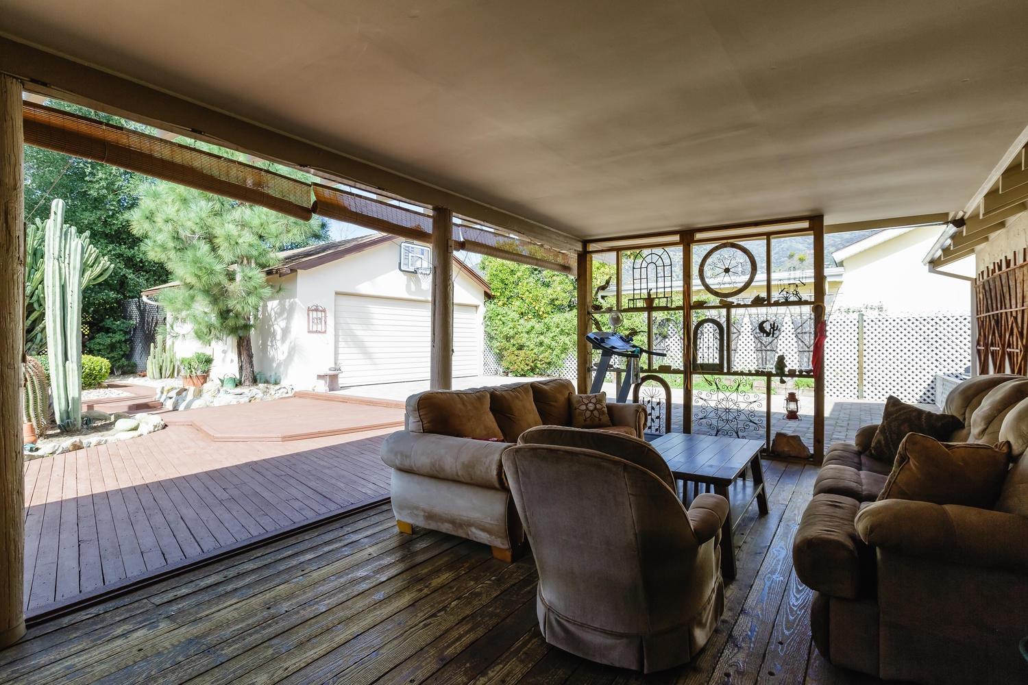 819 Daly Road Ojai, CA 93023 - Photo 23 of 25 a living room with furniture and a large window
