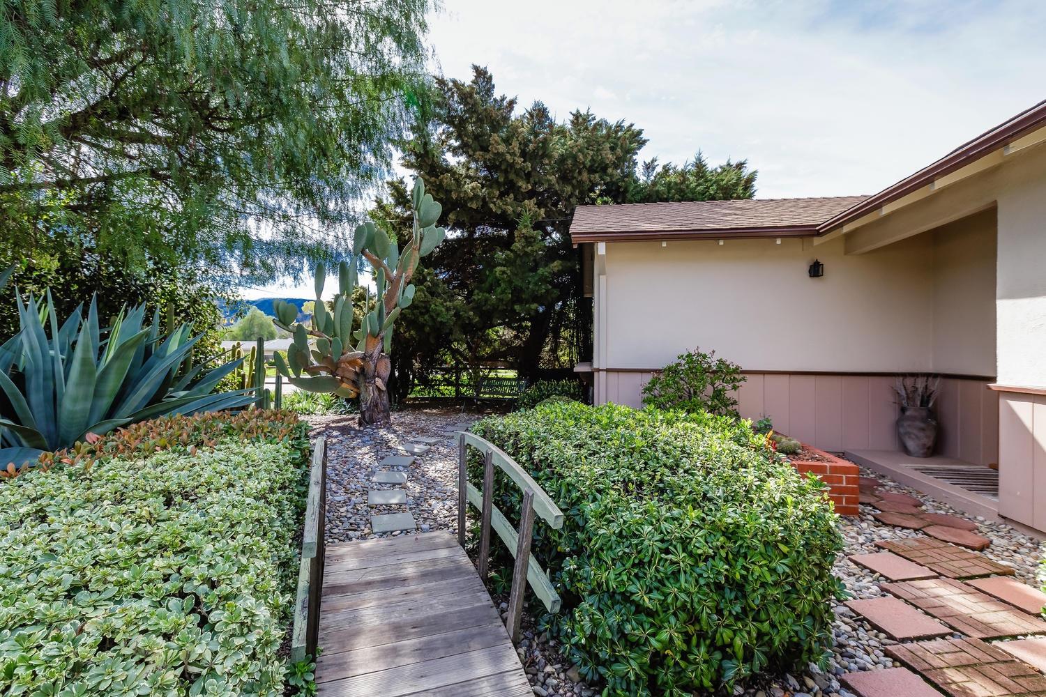 819 Daly Road Ojai, CA 93023 - Photo 24 of 25 a front view of a house with a yard
