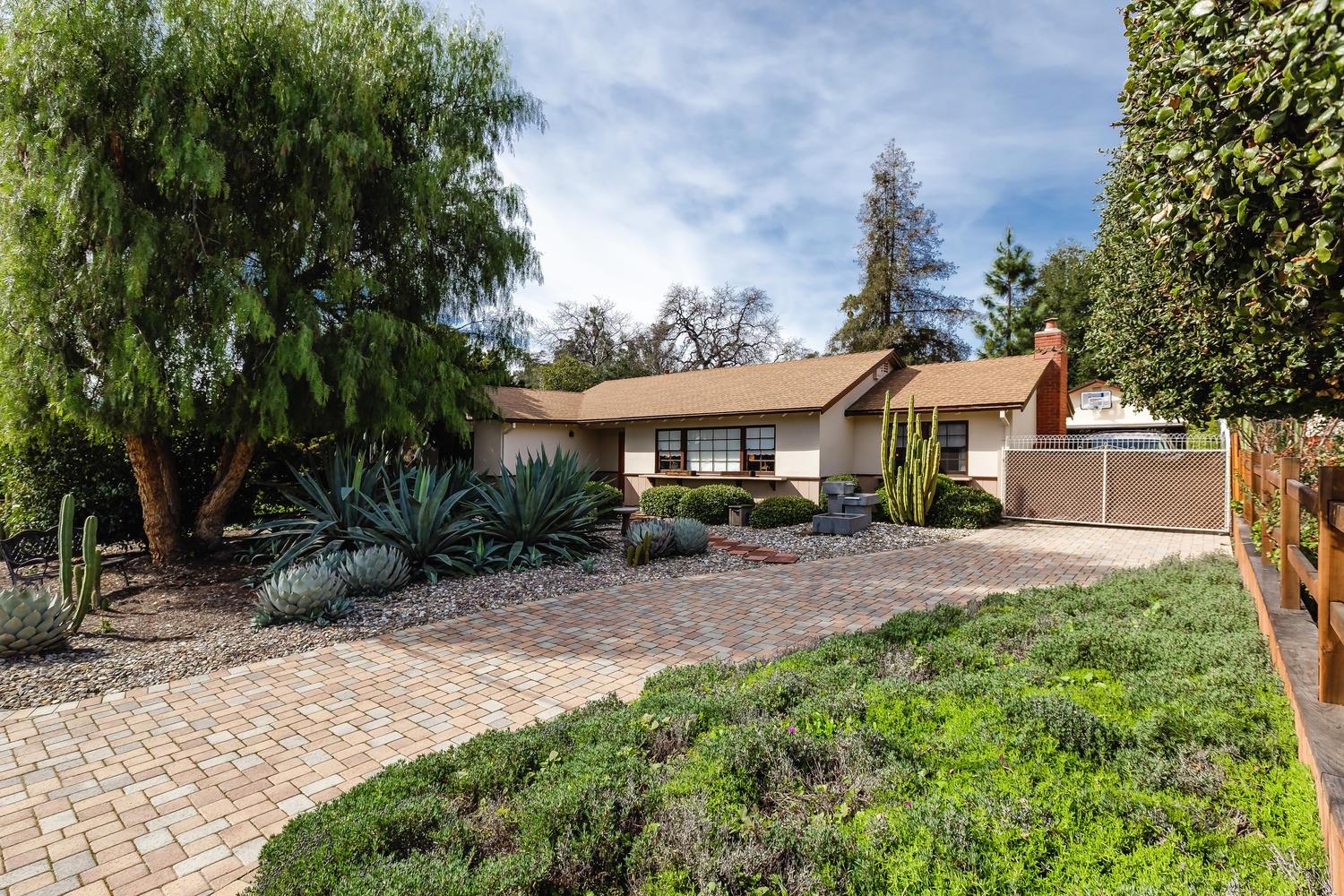 819 Daly Road Ojai, CA 93023 - Photo 25 of 25 a front view of a house with a yard and shrubs