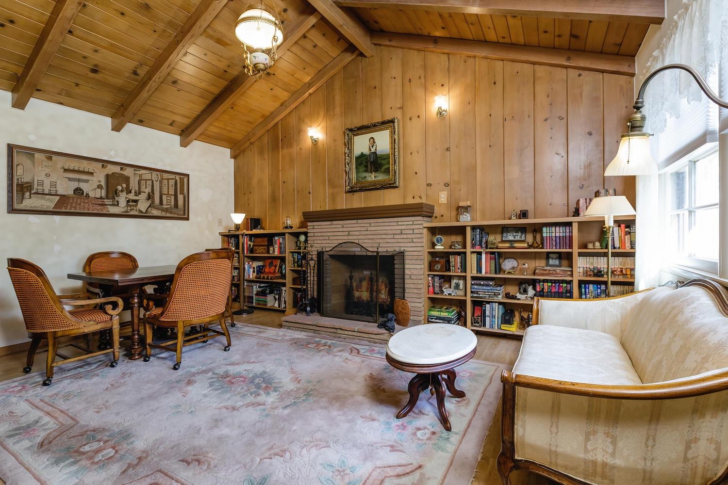819 Daly Road Ojai, CA 93023 - Photo 5 of 25 a view of a livingroom with furniture and a fireplace