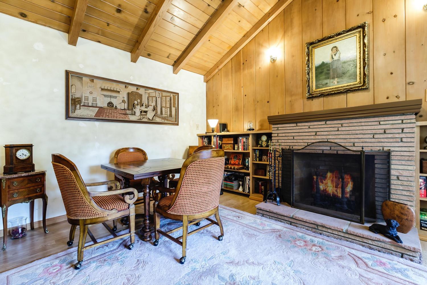 819 Daly Road Ojai, CA 93023 - Photo 7 of 25 a living room with furniture and a fireplace