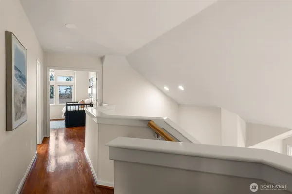 a kitchen with a refrigerator and a sink