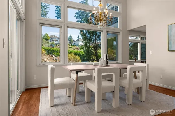 a view of a dining room with furniture window and outside view