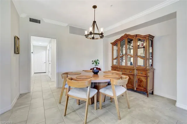 a dining room with furniture window wooden floor