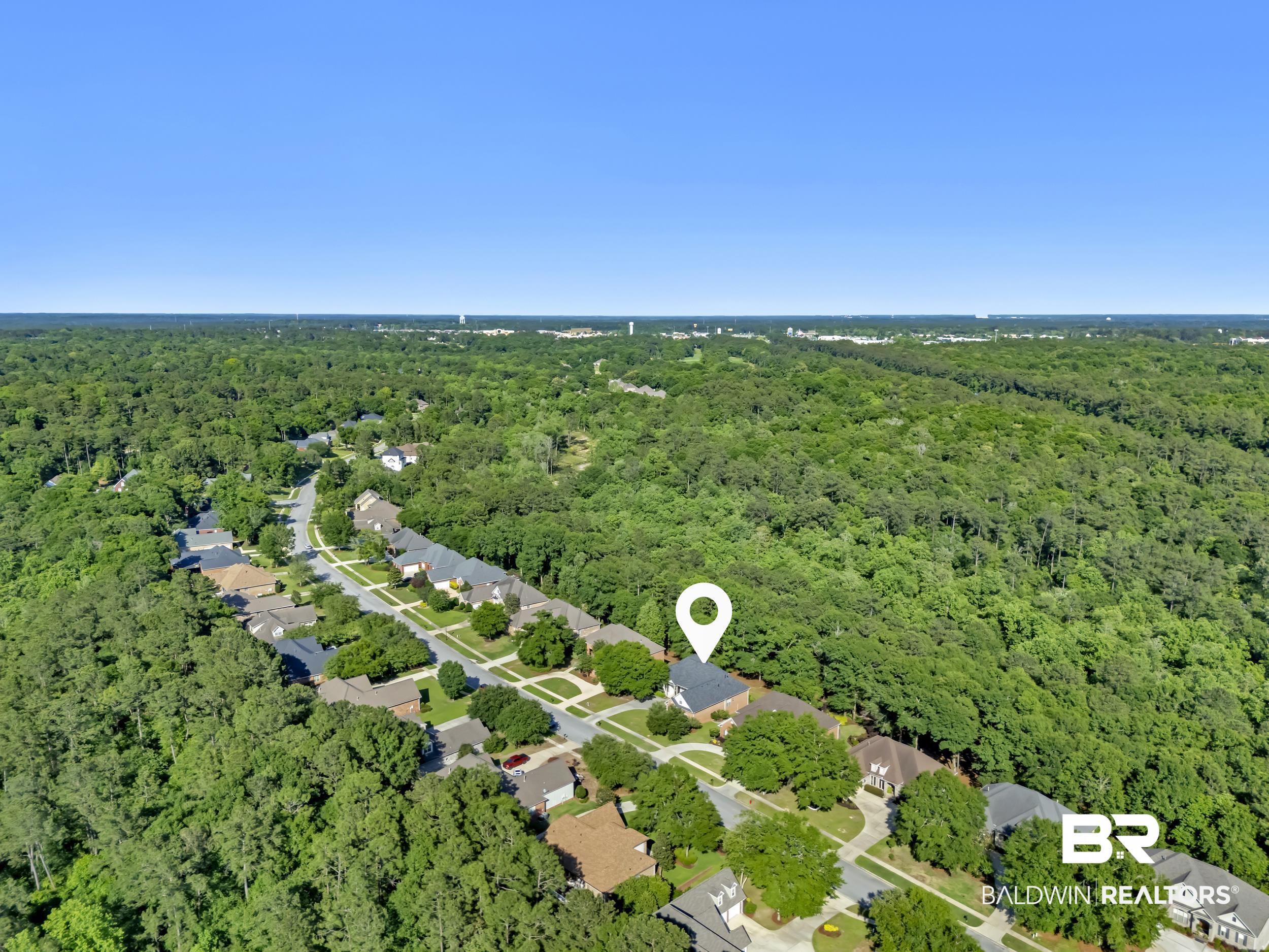 8137 Pine Run Daphne, AL 36527 - Photo 49 of 67 Residential street with homes and mature trees