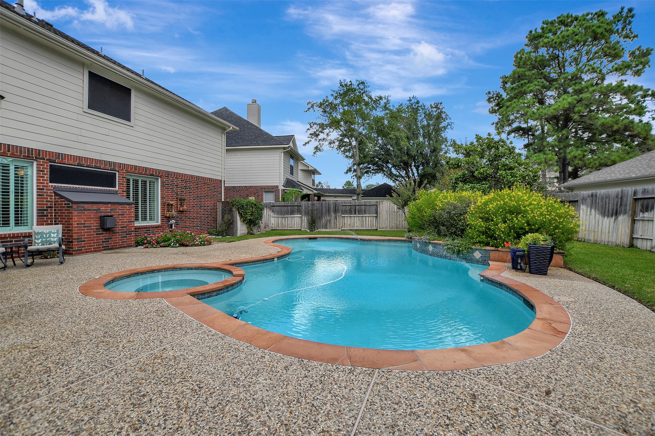 15918 Lake Loop Drive Cypress, TX 77433 - Photo 50 of 50 a view of a house with swimming pool