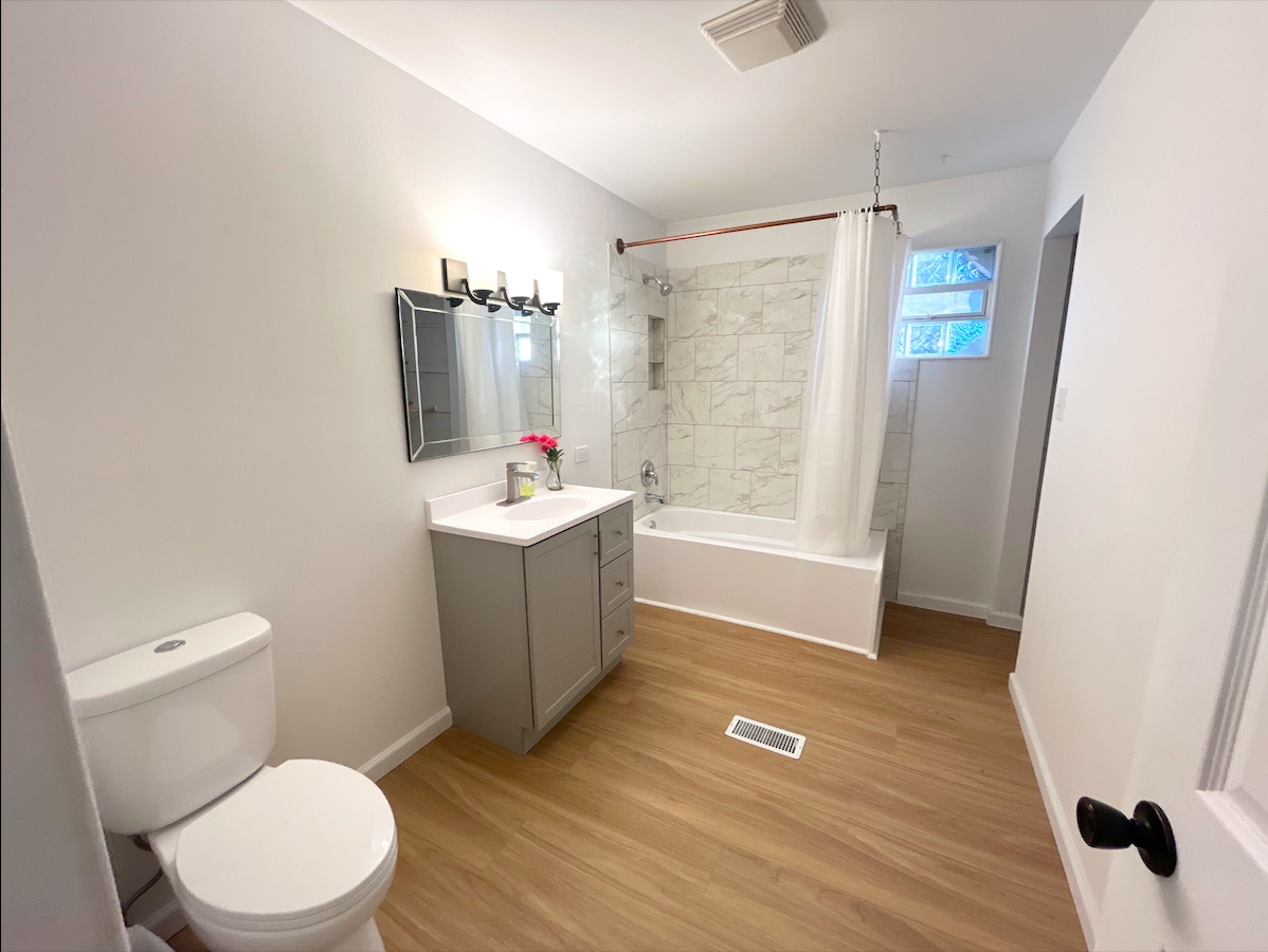 2351 Caton Farm Road Crest Hill, IL 60403 - Photo 20 of 24 a bathroom with a sink a toilet and shower