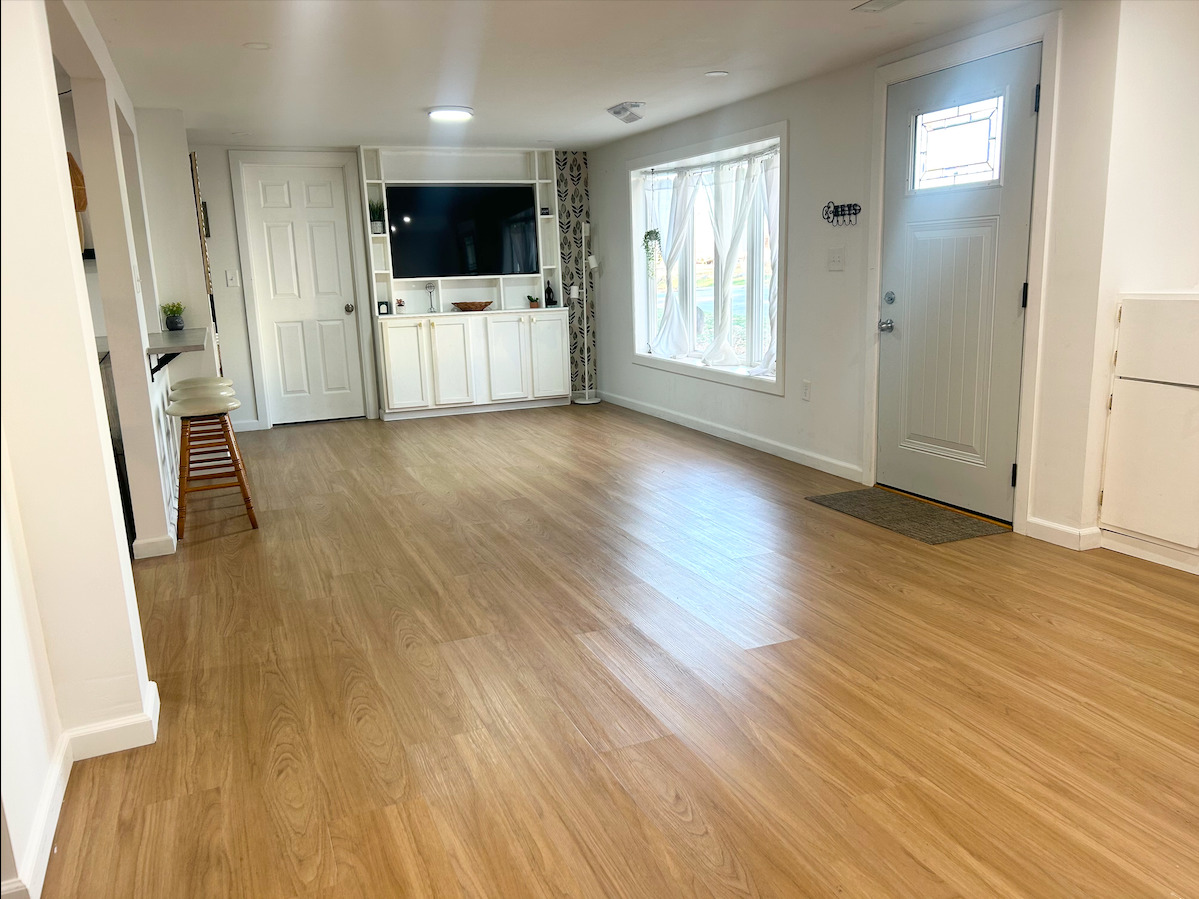 2351 Caton Farm Road Crest Hill, IL 60403 - Photo 4 of 24 an empty room with wooden floor and a window