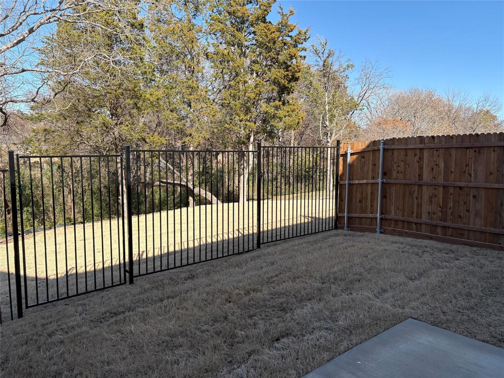 6357 Manson Court Dallas, TX 75227 - Photo 7 of 7 a view of a backyard
