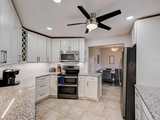 a view of storage and utility room with washer and dryer