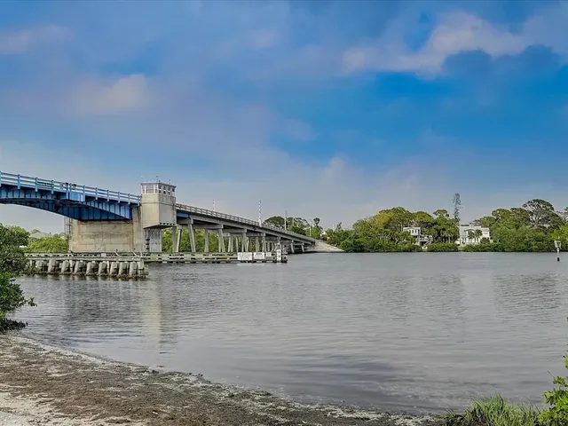 a view of a city and lake