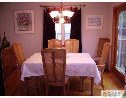 17 Finley Road Edison, NJ 08817 - Photo 4 of 10 a view of a dining room with furniture and window