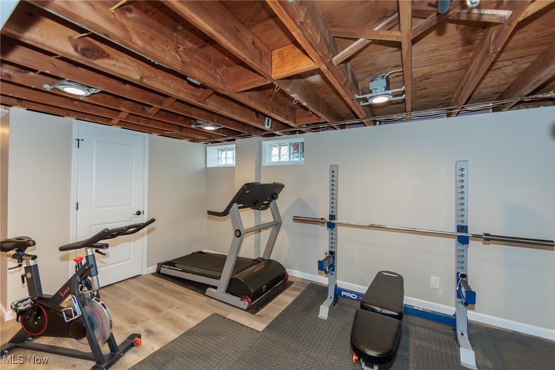 7316 Oakwood Road Parma, OH 44130 - Photo 29 of 41 Workout area with light wood-type flooring and baseboards
