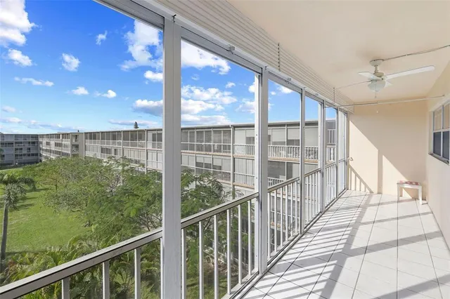 a view of porch with a floor to ceiling window