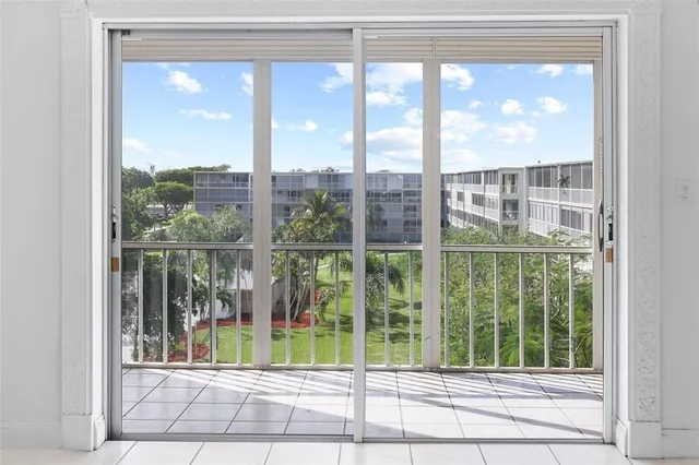 a view of a hallway with a white walls