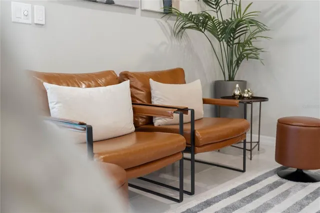 a view of kitchen with furniture and large window