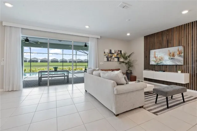 a work room with furniture and a window