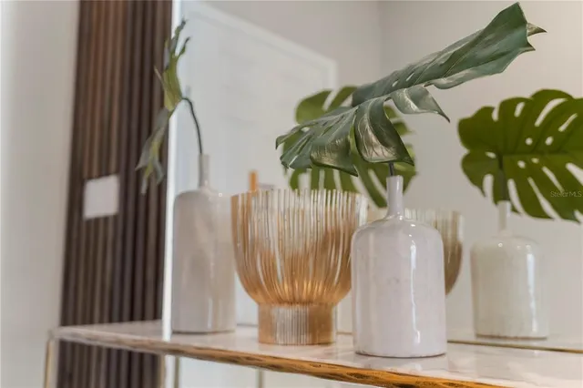a view of a couches and table in the balcony