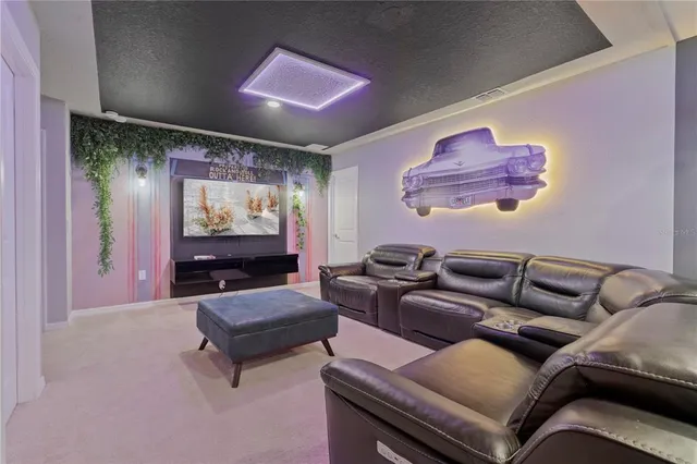 a bathroom with a granite countertop sink a toilet and a mirror