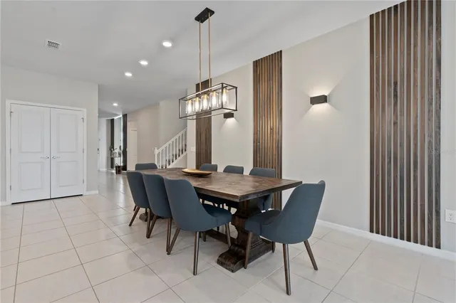 a view of a dining room with furniture