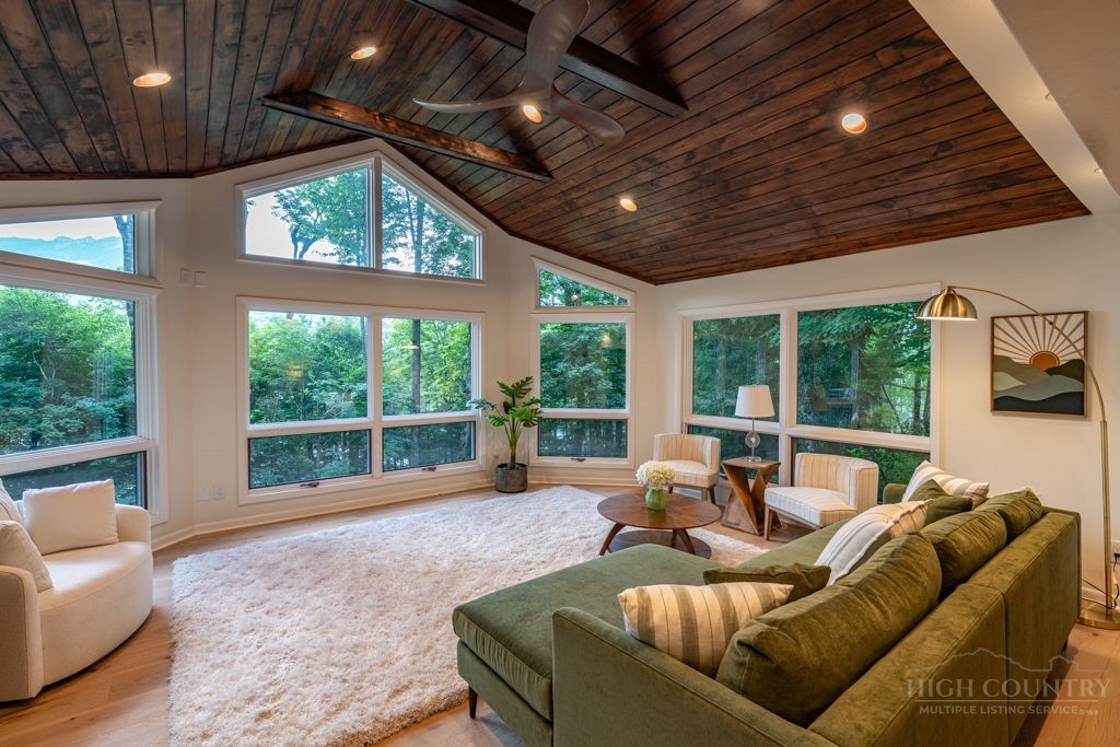 102 Ridge Drive Linville, NC 28646 - Photo 9 of 48 a living room with furniture and a large window