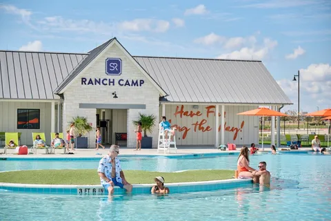 a play ground with the view of the swimming pool