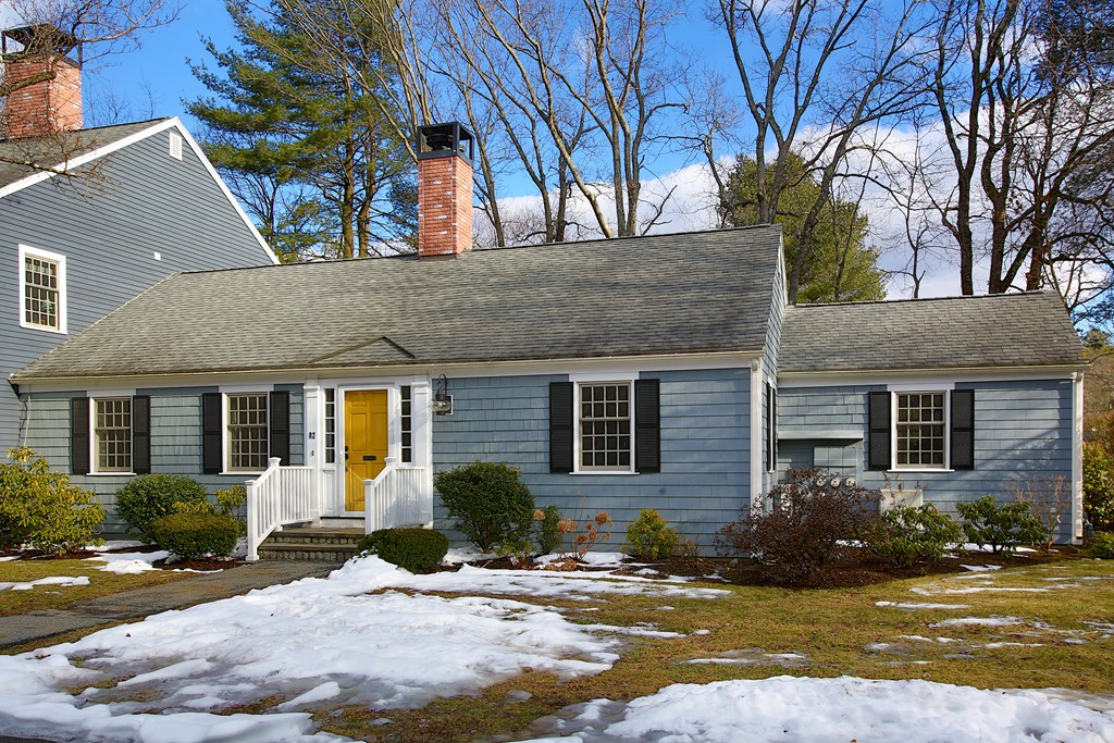 82 Jericho Road, Unit 82 Weston, MA 02493 - Photo 1 of 9 front view of house with a yard