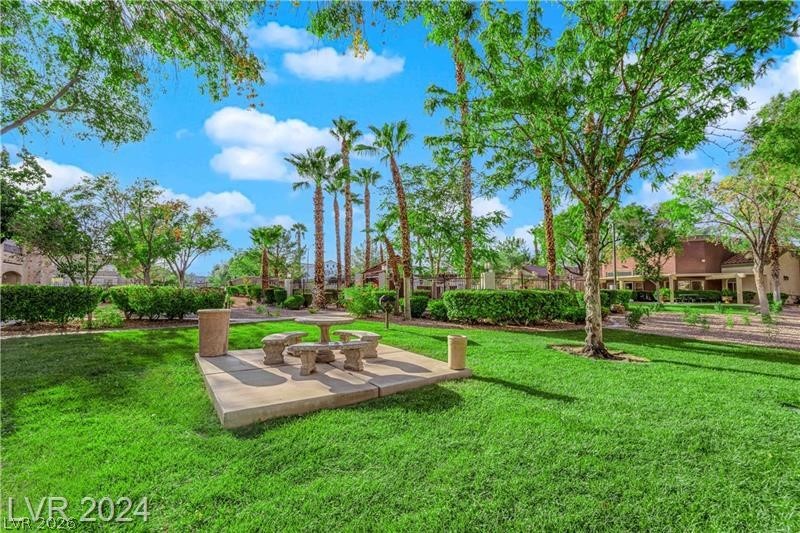 7885 West Flamingo Road, Unit 2004 Las Vegas, NV 89147 - Photo 19 of 23 This lush green space offers a serene escape with ample room for outdoor enjoyment.