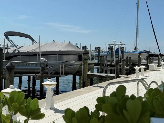 a living room with furniture a flat screen tv and floor